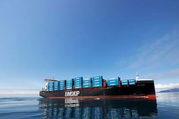Aerial view of a container ship at sea carrying export cargo
